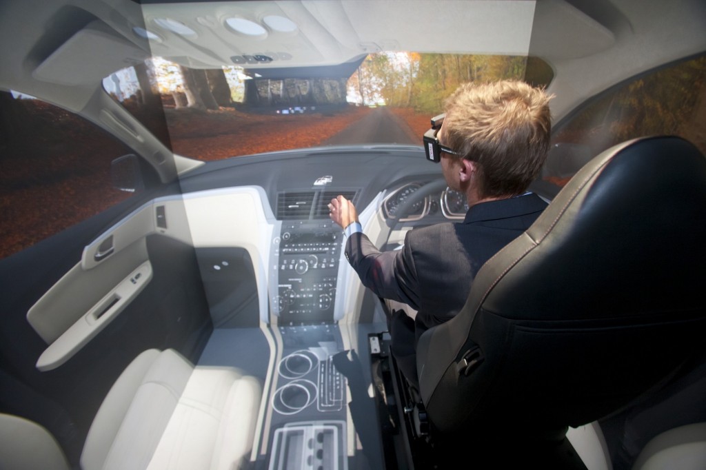 Matthew Davis, Director Global Quality, is immersed in a virtual 3D tour of the Chevrolet Traverse in the Cave Automated Virtual Environment (CAVE) in the Virtual Vehicle Engineering Center (VVEC) at General Motors Tech Center, in Warren, MI, Friday, September 30, 2011. (Jeffrey Sauger/For Chevrolet)