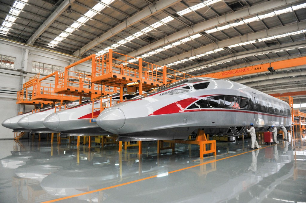 QINGDAO, CHINA - JUNE 08: Working staff assemble China's 'Fuxing' high-speed bullet trains at the manufacturing line of CRRC Qingdao Sifang Co., Ltd. on June 8, 2018 in Qingdao, Shandong Province of China. Located in the Jihongtan Town of Qingdao, CRRC Qingdao Sifang Co., Ltd covers an area of 1.77 million square meters. (Photo by Visual China Group via Getty Images/Visual China Group via Getty Images)