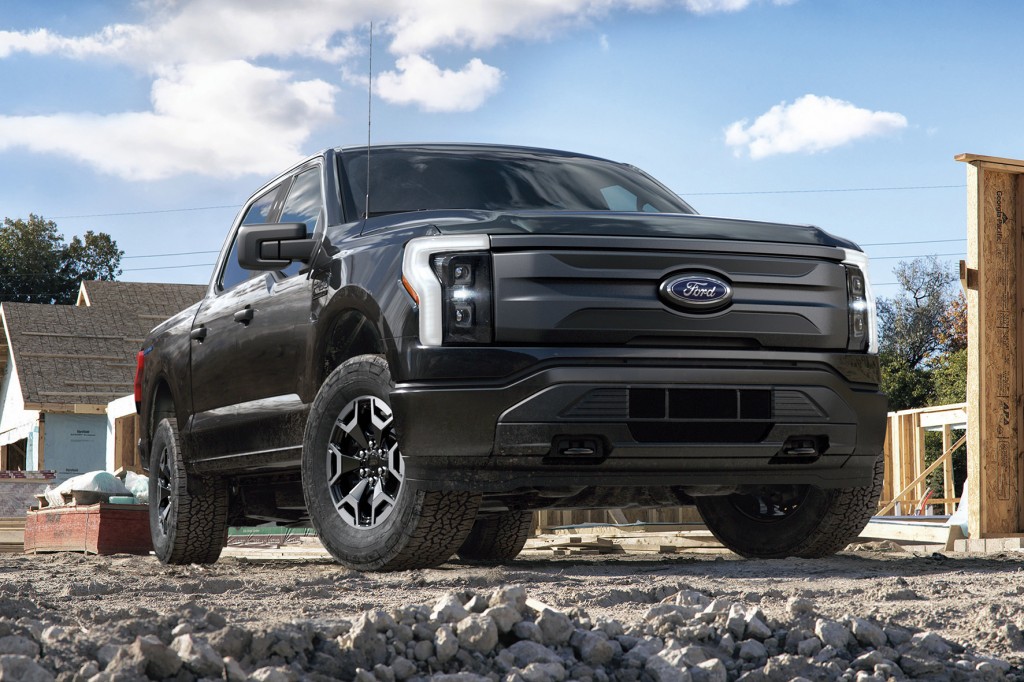 2022 Ford F-150 Lightning Pro. Pre-production model with available features shown. Available starting spring 2022.