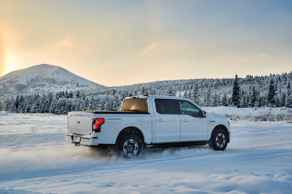 Preproduction model with optional equipment driven under test conditions. Professional driver on closed course. Do not attempt. 2022 Ford F-150 Lightning production begins spring 2022.