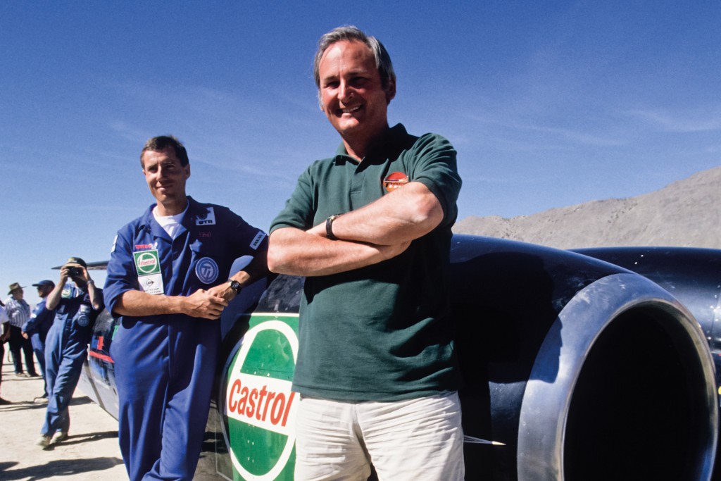BLACK ROCK DESERT, NV - SEPTEMBER 1997:  Richard Noble, project director of the Thrust SSC team, and driver Andy Green, stand with the Thrust SSC car in September 1997 in the Black Rock Desert north of Reno, Nevada.  The car eventually set a series of land speed records, culminating in the first supersonic land speed record of 763 mph.  (Photo by David Madison/Getty Images)