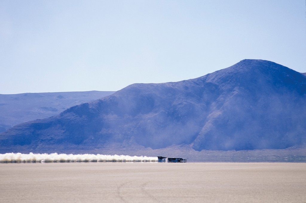 BLACK ROCK DESERT, NV - SEPTEMBER 1997:  The Thrust SSC car makes a speed run in September 1997 in the Black Rock Desert north of Reno, Nevada.  The car eventually set a series of land speed records, culminating in the first supersonic land speed record of 763 mph.  (Photo by David Madison/Getty Images)